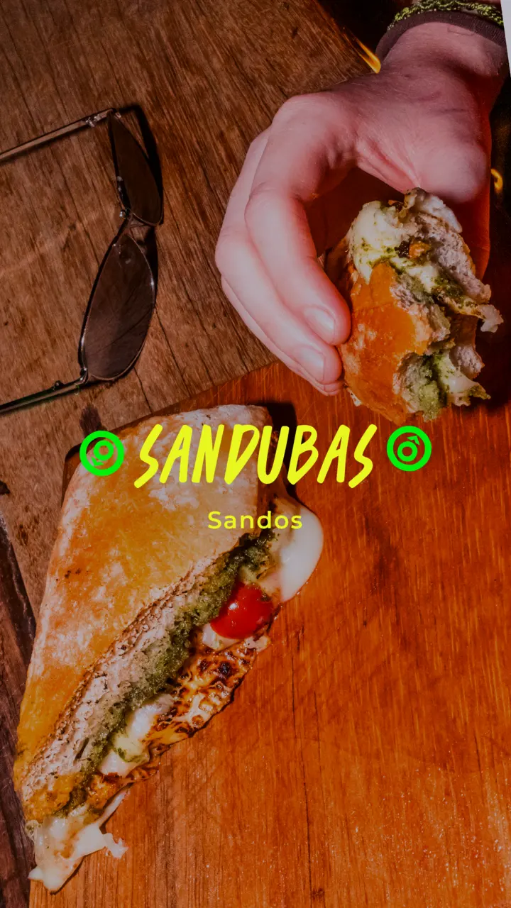 A sandwich being made, highlight cover reading SANDUBAS.